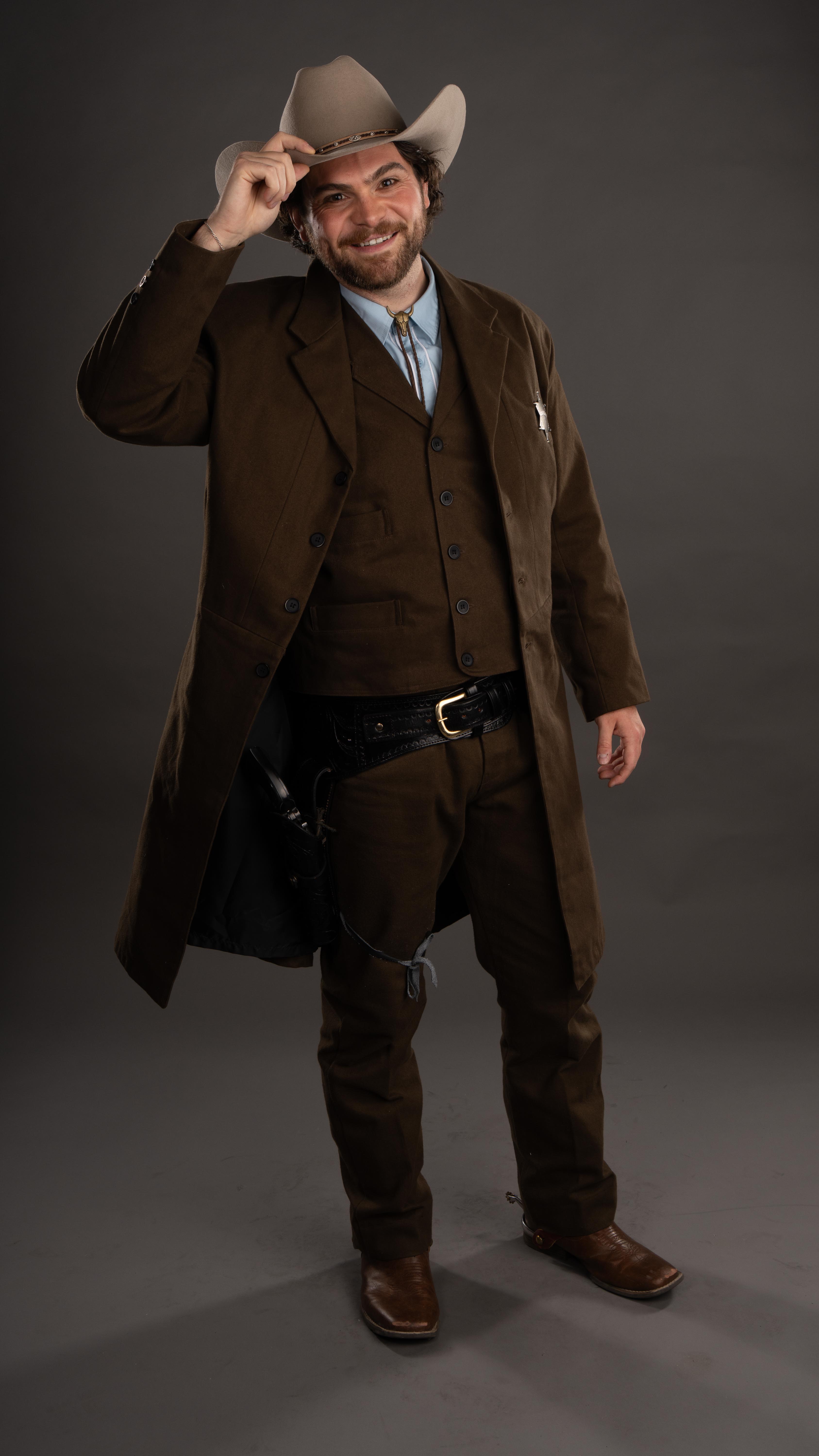 Tipping my cowboy hat in costume